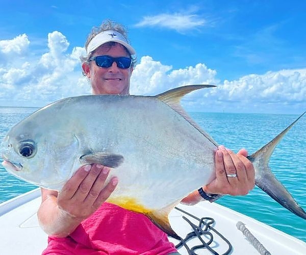  Holding up catch from an 8-hour trip